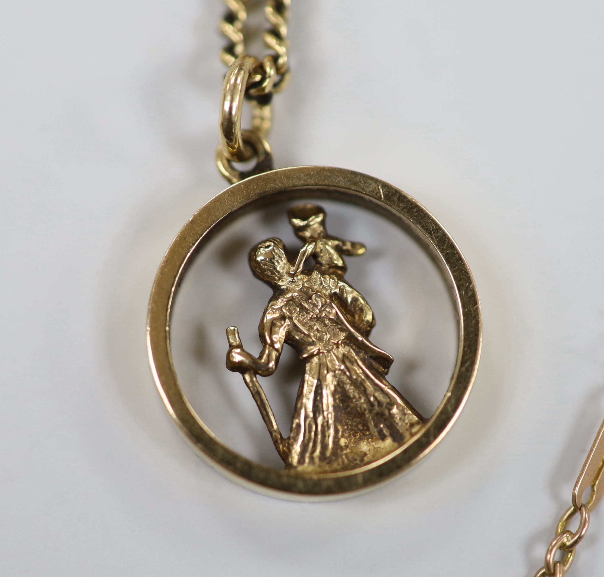 Two 9ct pendant necklaces, one with cross pendant, a 9ct gold hinged bangle and a 9ct chain, 23.4 grams.